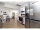 Modern kitchen with stainless steel appliances and a convenient layout for cooking and dining at 210 83Rd N Ave, St Petersburg, FL 33702