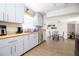 Bright kitchen featuring sleek cabinets, butcher block countertops, and modern appliances at 210 83Rd N Ave, St Petersburg, FL 33702