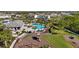 The aerial photo highlights a pool, playground, and various outdoor amenities, creating an active and social community at 3248 Anchor Bay Trl, Bradenton, FL 34211