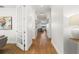 Hallway with wood floors connecting the rooms of the home at 3248 Anchor Bay Trl, Bradenton, FL 34211