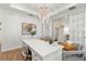 Bright office features a decorative chandelier, white trim, and plenty of natural light at 3248 Anchor Bay Trl, Bradenton, FL 34211