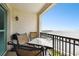 Balcony with seating, overlooking ocean view, and the city skyline in the distance at 345 Bayshore Blvd # P9, Tampa, FL 33606