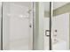Bright bathroom featuring a glass-enclosed shower and separate soaking tub at 345 Bayshore Blvd # P9, Tampa, FL 33606