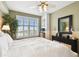 Tranquil bedroom with plantation shutters offers natural light and scenic views at 345 Bayshore Blvd # P9, Tampa, FL 33606