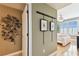 Stylish hallway leading to the bedroom with modern art and a bright, airy feel at 345 Bayshore Blvd # P9, Tampa, FL 33606