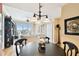 Open concept dining area with wood flooring and a view into the living room at 345 Bayshore Blvd # P9, Tampa, FL 33606