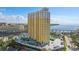 Stunning high-rise condo building overlooking the water on a bright day with palm trees at 345 Bayshore Blvd # P9, Tampa, FL 33606