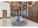 Grand foyer with soaring ceilings, marble floors, a chandelier, and elegant entryway at 345 Bayshore Blvd # P9, Tampa, FL 33606