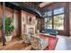 Stunning living room features hardwood floors, a fireplace, and spiral staircase to upper level at 345 Bayshore Blvd # P9, Tampa, FL 33606