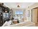 Bright living room with a balcony and large built in bookcase at 345 Bayshore Blvd # P9, Tampa, FL 33606