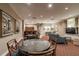 Comfortable lounge area with cozy seating, tables, and a built-in entertainment unit at 345 Bayshore Blvd # P9, Tampa, FL 33606