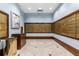 Well-lit mail room features rows of mailboxes, wooden cabinets, and neutral tile flooring at 345 Bayshore Blvd # P9, Tampa, FL 33606