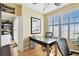 Comfortable office space with bright window, desk, and open access to the living room at 345 Bayshore Blvd # P9, Tampa, FL 33606