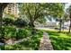 Beautiful community pet walk with lush greenery and stone path at 345 Bayshore Blvd # P9, Tampa, FL 33606