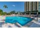 Outdoor pool with comfortable seating, mature landscaping, and a relaxing resort-style vibe at 345 Bayshore Blvd # P9, Tampa, FL 33606
