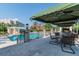 Beautiful outdoor pool area with shaded seating, mature palm trees, and relaxing resort views at 345 Bayshore Blvd # P9, Tampa, FL 33606