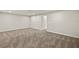 Spacious living room with plush carpeting and neutral wall color, ready for personalization at 3460 Timber Crossing Ave, Brandon, FL 33511