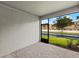 Enclosed patio with brick flooring providing views of the greenery and canal at 3460 Timber Crossing Ave, Brandon, FL 33511
