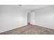 Clean, open bedroom with carpet and a light interior, offering versatile possibilities at 3479 Maclaren Dr, Palm Harbor, FL 34684