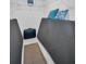 Well organized closet space with ample storage, shelving, and decor pillows at 3479 Maclaren Dr, Palm Harbor, FL 34684