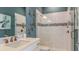 Stylish bathroom featuring a glass-enclosed shower with decorative tile accents and modern fixtures at 3559 Santa Caterina Blvd, Bradenton, FL 34211