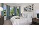 Bright bedroom with a bay window, patterned curtains, and coordinated decor, creating a relaxing space at 3559 Santa Caterina Blvd, Bradenton, FL 34211
