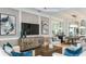 Open-concept living and dining area with modern furnishings and elegant decor at 3559 Santa Caterina Blvd, Bradenton, FL 34211