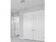 Bedroom with double door closet, neutral walls, and white trim at 3563 Santa Caterina Blvd, Bradenton, FL 34211