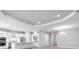 Bright, open layout showcases modern kitchen and dining area with recessed lighting at 3563 Santa Caterina Blvd, Bradenton, FL 34211