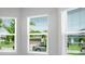 These bright windows feature views of the home's lush, tropical landscaping at 3563 Santa Caterina Blvd, Bradenton, FL 34211