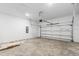 Spacious garage with concrete flooring and ample overhead storage at 3575 Santa Caterina Blvd, Bradenton, FL 34211