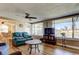 Bright living room featuring water views, wood flooring, and stylish furniture, creating a welcoming atmosphere at 3805 Baden Dr, Holiday, FL 34691