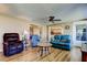 Inviting living room with stylish seating, wood floors, and an open layout, perfect for relaxation and gatherings at 3805 Baden Dr, Holiday, FL 34691