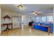 Inviting living space with tile floors, neutral walls, and views through to the living room at 3805 Baden Dr, Holiday, FL 34691