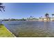 Scenic waterfront views with clear blue skies and neighboring homes at 3805 Baden Dr, Holiday, FL 34691
