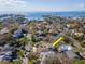 Great aerial view of a home with beautiful surroundings in a peaceful neighborhood near the water at 4809 W Juno St, Tampa, FL 33629