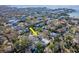 Gorgeous aerial view of a charming waterfront neighborhood with mature landscaping and stunning water views at 4809 W Juno St, Tampa, FL 33629
