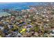 Waterfront community aerial view with the home indicated by a yellow arrow, providing an idyllic neighborhood setting at 4809 W Juno St, Tampa, FL 33629