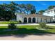 Charming single-story home with lush front yard and elegant arched entryway at 4809 W Juno St, Tampa, FL 33629