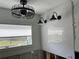 White subway tile with black light fixtures are being installed next to the window at 4809 W Juno St, Tampa, FL 33629