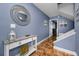 Cozy foyer with modern décor, beautiful walls, and tiled floor at 538 Walden Ct, Dunedin, FL 34698