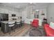 Open floor plan blending the kitchen, dining, and living areas for seamless entertaining at 538 Walden Ct, Dunedin, FL 34698