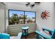 Outdoor patio with seating area and scenic neighborhood views at 538 Walden Ct, Dunedin, FL 34698