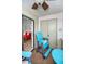 Cozy patio with comfortable seating and a view into the interior living area at 538 Walden Ct, Dunedin, FL 34698