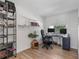 Office room showing a modern black desk and ample natural light from the window at 5973 Leeland S St, St Petersburg, FL 33715