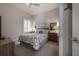 Comfortable bedroom features neutral decor and lots of natural light at 6915 Sea Stone Ct, Apollo Beach, FL 33572