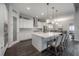 Open concept kitchen with large island, pendant lighting, and stainless steel appliances at 6915 Sea Stone Ct, Apollo Beach, FL 33572