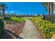 Scenic recreation area with walking path, volleyball court, and picnic tables amongst manicured landscaping at 6915 Sea Stone Ct, Apollo Beach, FL 33572