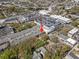 Aerial view of the property and surrounding area, with an arrow indicating its location at 711 S Oregon Ave, Tampa, FL 33606
