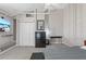 Bedroom with a closet, TV, fan, and modern decor creating a calm and inviting space at 711 S Oregon Ave, Tampa, FL 33606